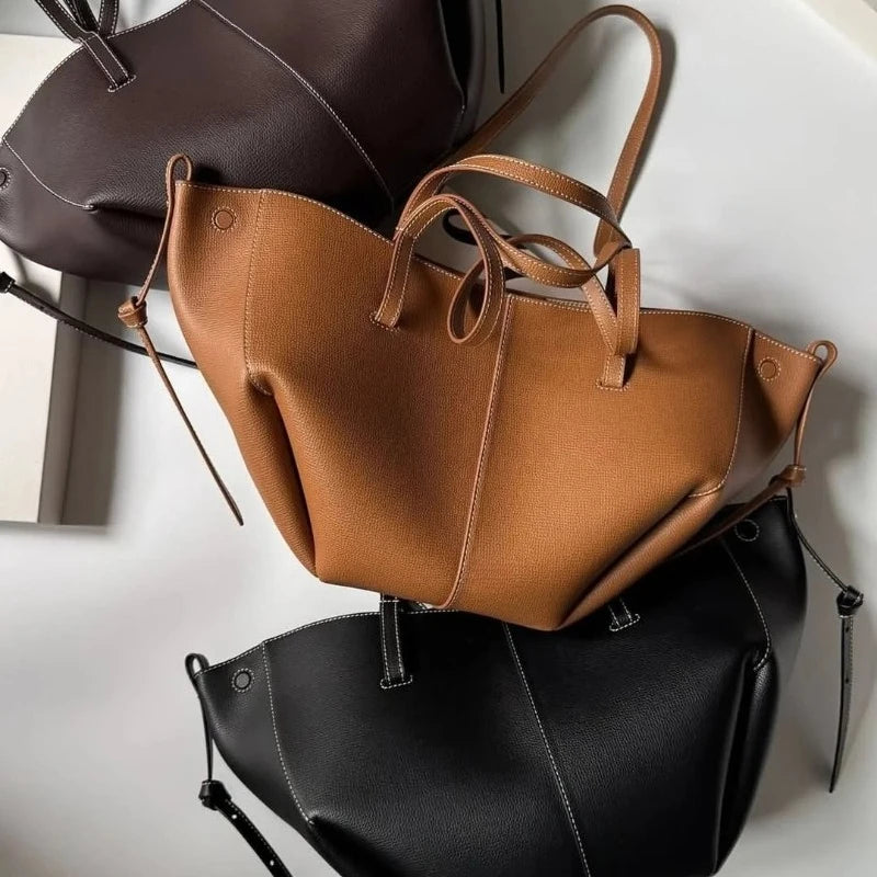 2026 new High quality wing bag, one shoulder hand-held armpit tote bag, cowhide bucket bag, large capacity leather bag